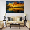 Towers with reflection at sunrise Multi panel canvas wall art