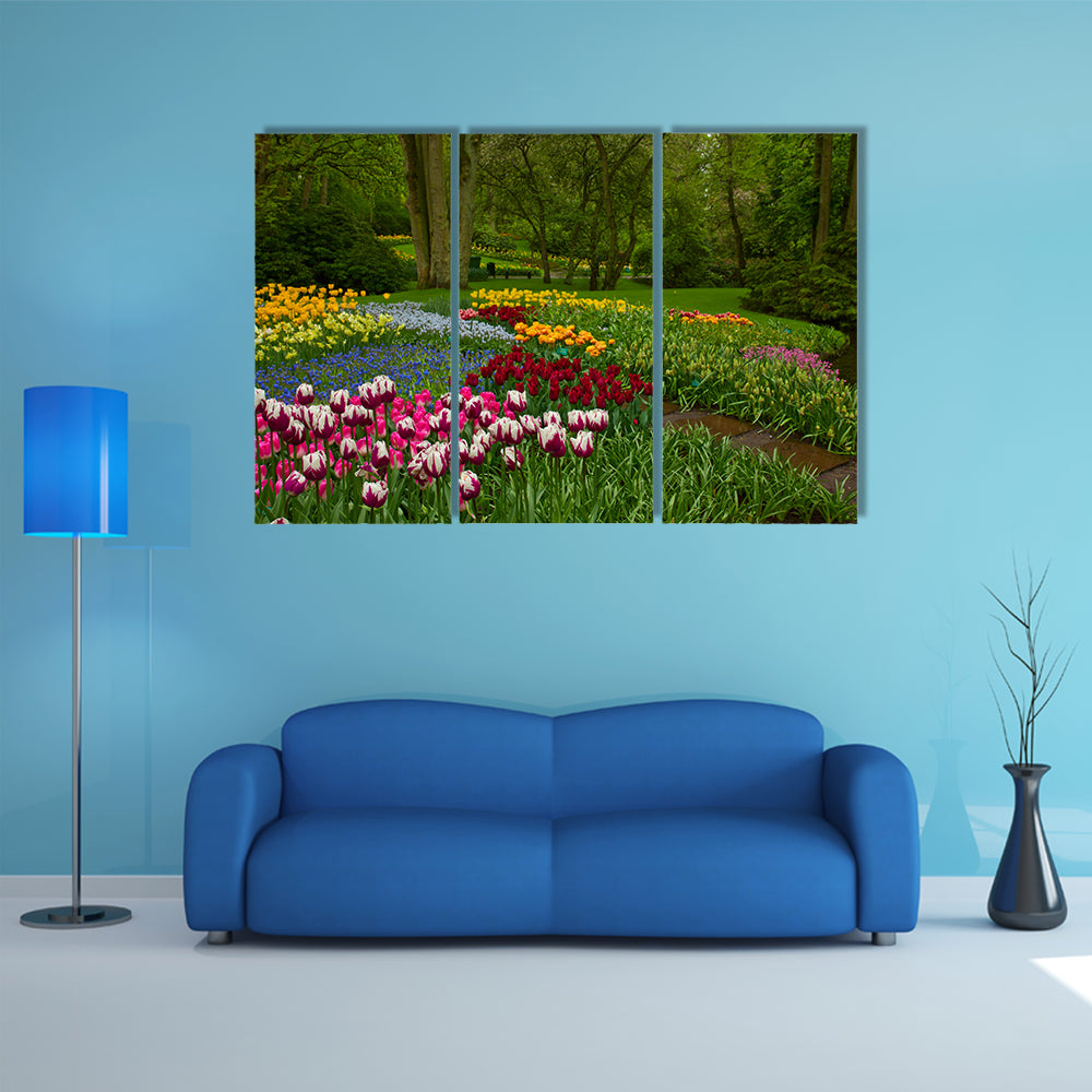 Colorful spring flowers and blossom in dutch garden Keukenhof , Holland multi panel canvas wall art