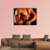 Muscular man top body studio shot Multi panel canvas wall art