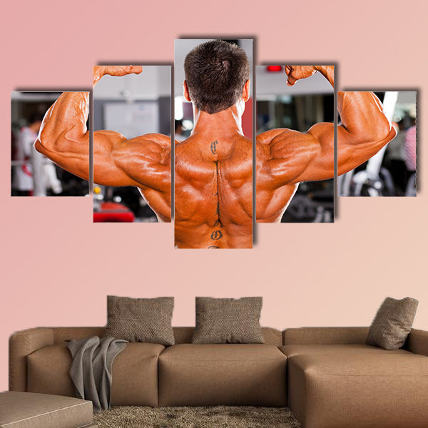 rear view of male bodybuilder Multi panel canvas wall art