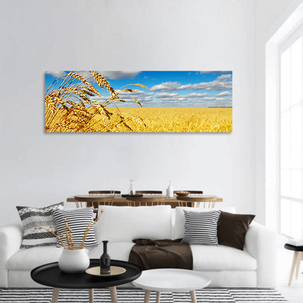 Ripe wheat ears over wheat field panoramic canvas wall art