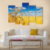 Ripe wheat ears over wheat field Multi panel canvas wall art