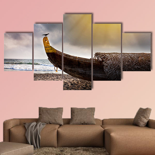 Fishing boat on the beach with crow on it near the ocean wall art