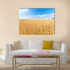 Ripe wheat field and blue sky with clouds Multi panel canvas wall art