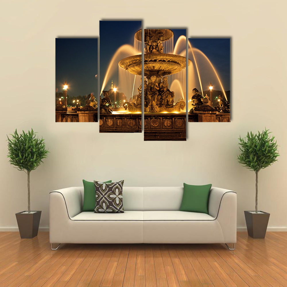 Fountain in the Place with the Eiffel Tower to rear at night, Paris, France Multi panel canvas wall art