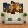 Fountain in the Place with the Eiffel Tower to rear at night, Paris, France Multi panel canvas wall art