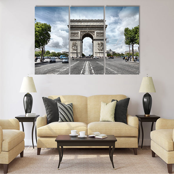 famous Triumphal Arch located at end of Champs-Elysees street Multi Panel Canvas Wall Art