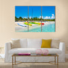 Kayaks And Sailing Boats On The Beautiful Beach Of Varadero In Cuba Multi Panel Canvas Wall Art