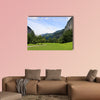 Green alpine meadow near Trummelbach Falls, Switzerland multi panel canvas wall art