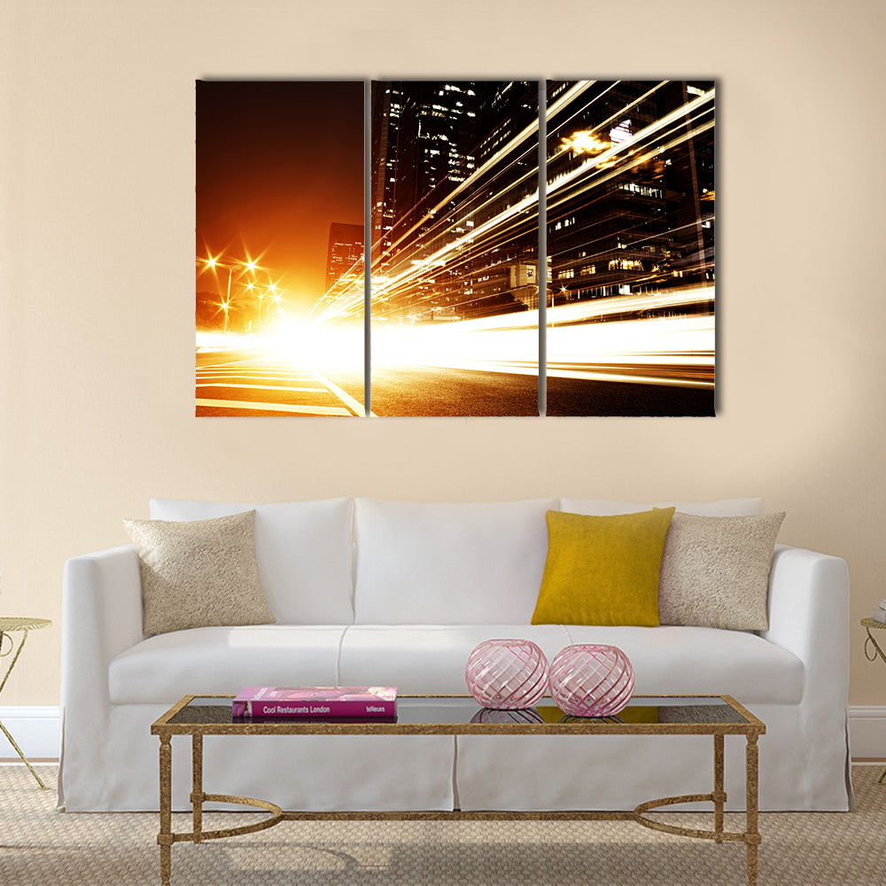 Fast moving cars at night Multi Panel Canvas Wall Art