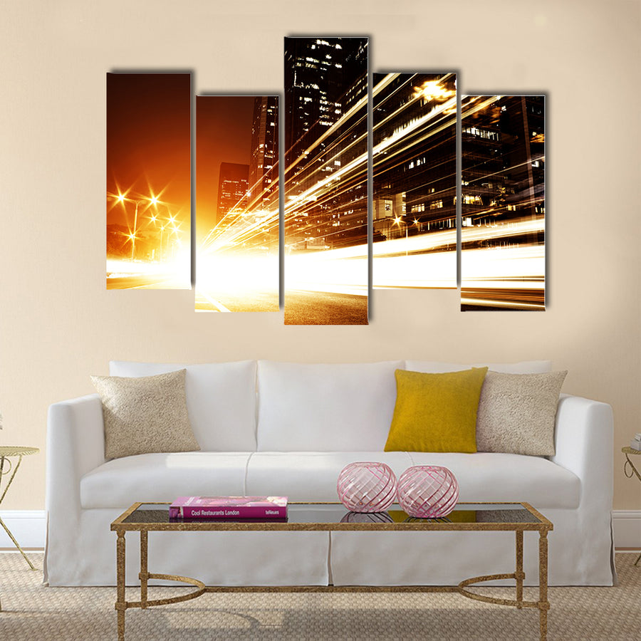 Fast moving cars at night Multi Panel Canvas Wall Art