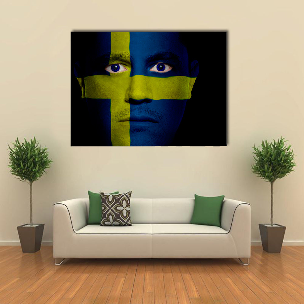 Swedish Flag Painted Onto A Man's Face Multi Panel Canvas Wall Art