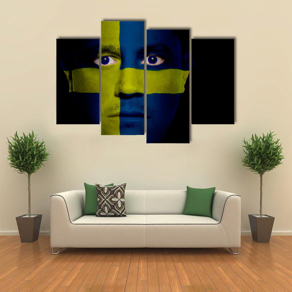 Swedish Flag Painted Onto A Man's Face Multi Panel Canvas Wall Art