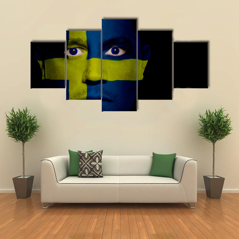 Swedish Flag Painted Onto A Man's Face Multi Panel Canvas Wall Art