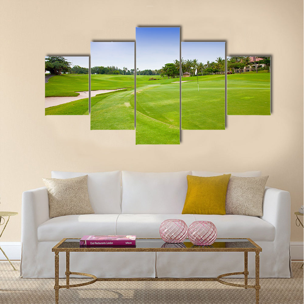 Green field for golf near hotel Multi Panel Canvas Wall Art