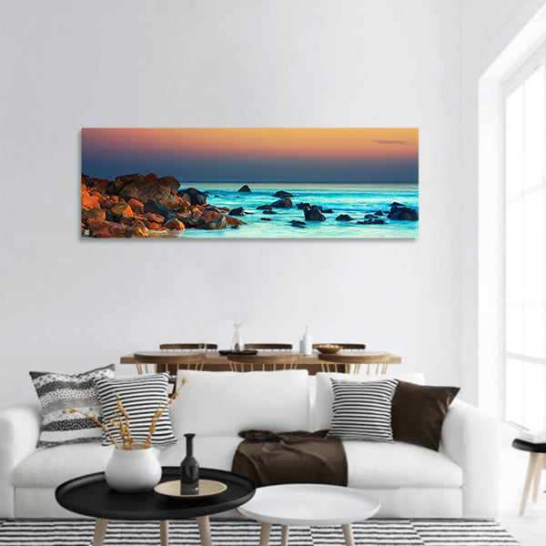 Sunset over the sea Stone on the foreground panoramic canvas wall art