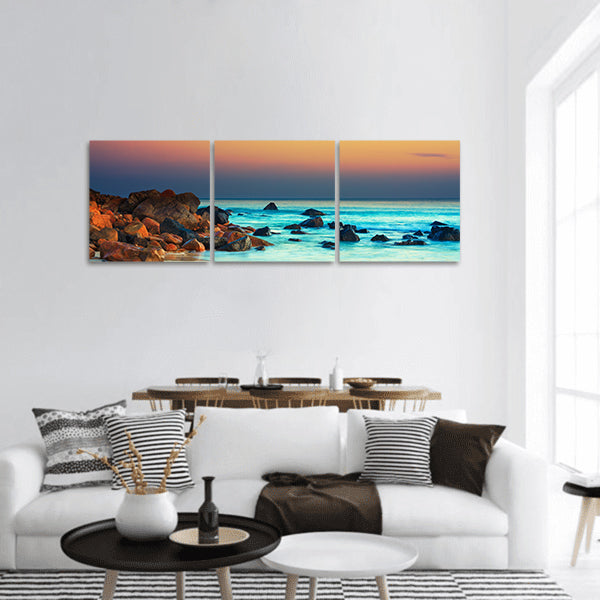 Sunset over the sea Stone on the foreground panoramic canvas wall art