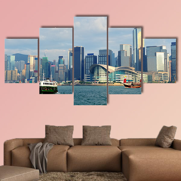 Urban architecture in Hong Kong Victoria Harbor in the day with blue sky wall art