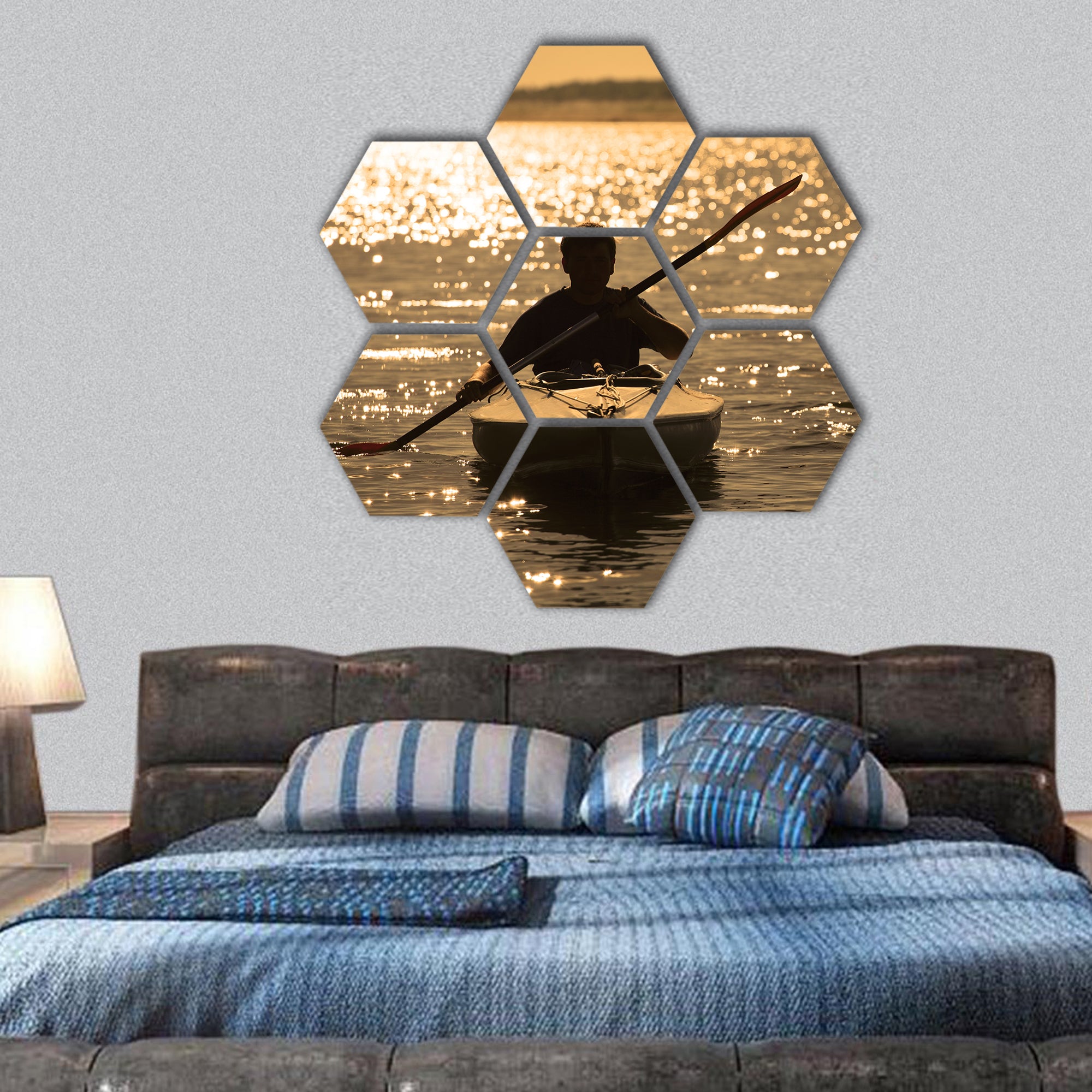 Silhouette of a man rowing in the canoe hexagonal canvas wall art