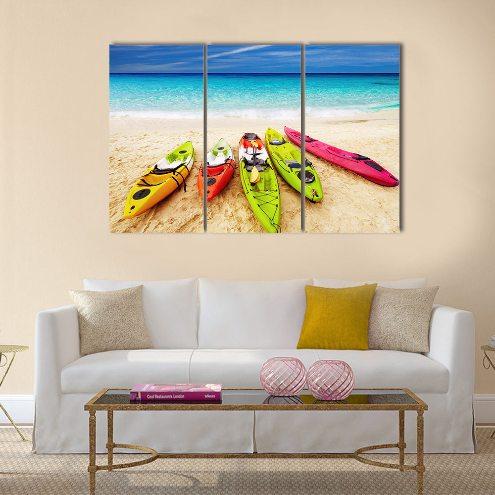Colorful kayaks on the tropical beach Multi panel canvas wall art