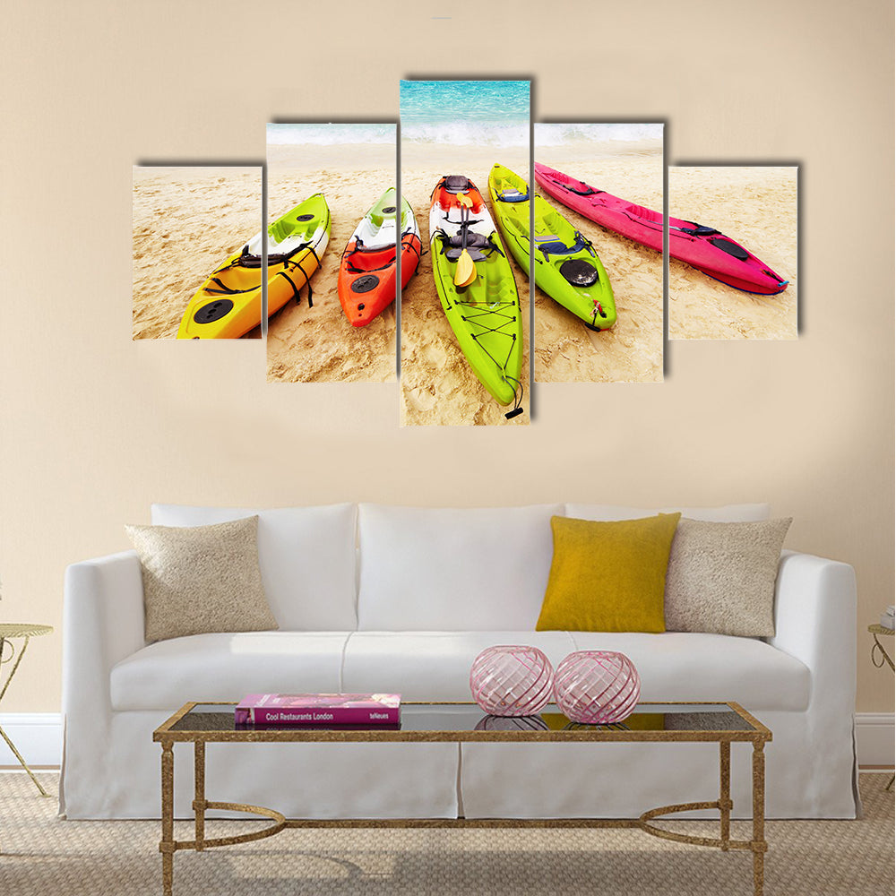 Colorful kayaks on the tropical beach Multi panel canvas wall art