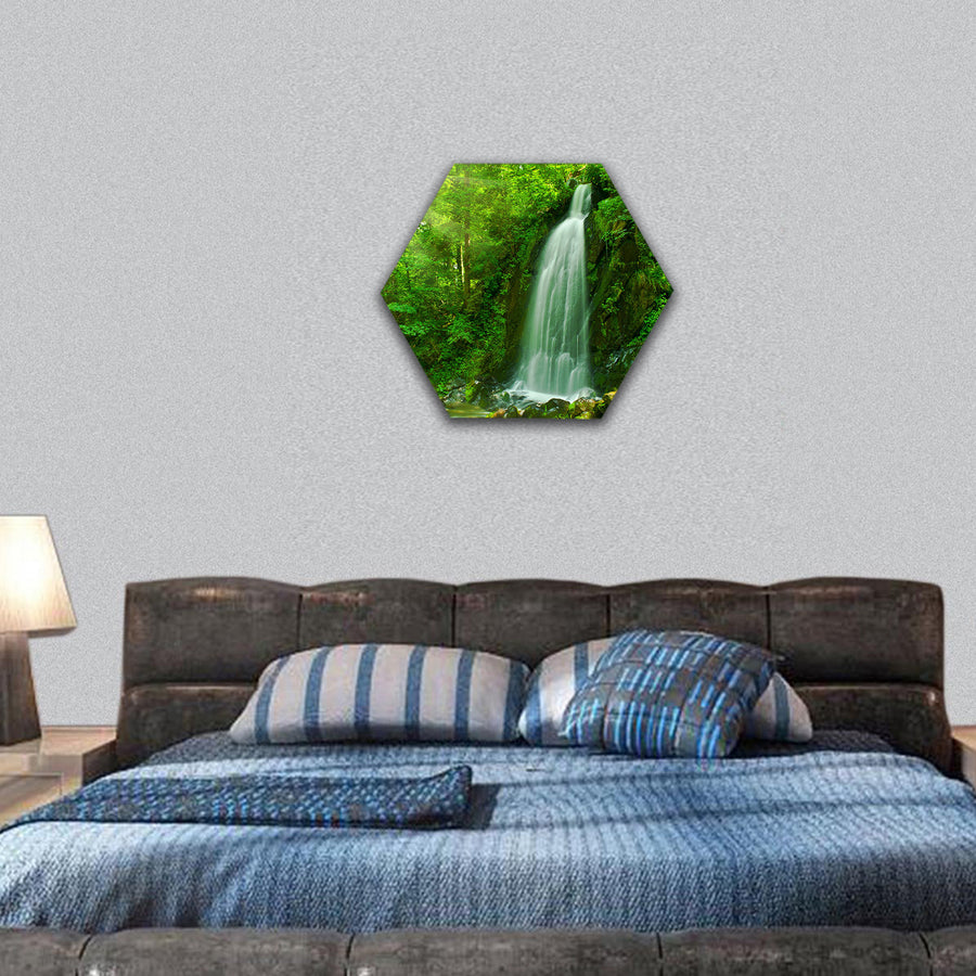 nice waterfall through green forest hexagonal canvas wall art
