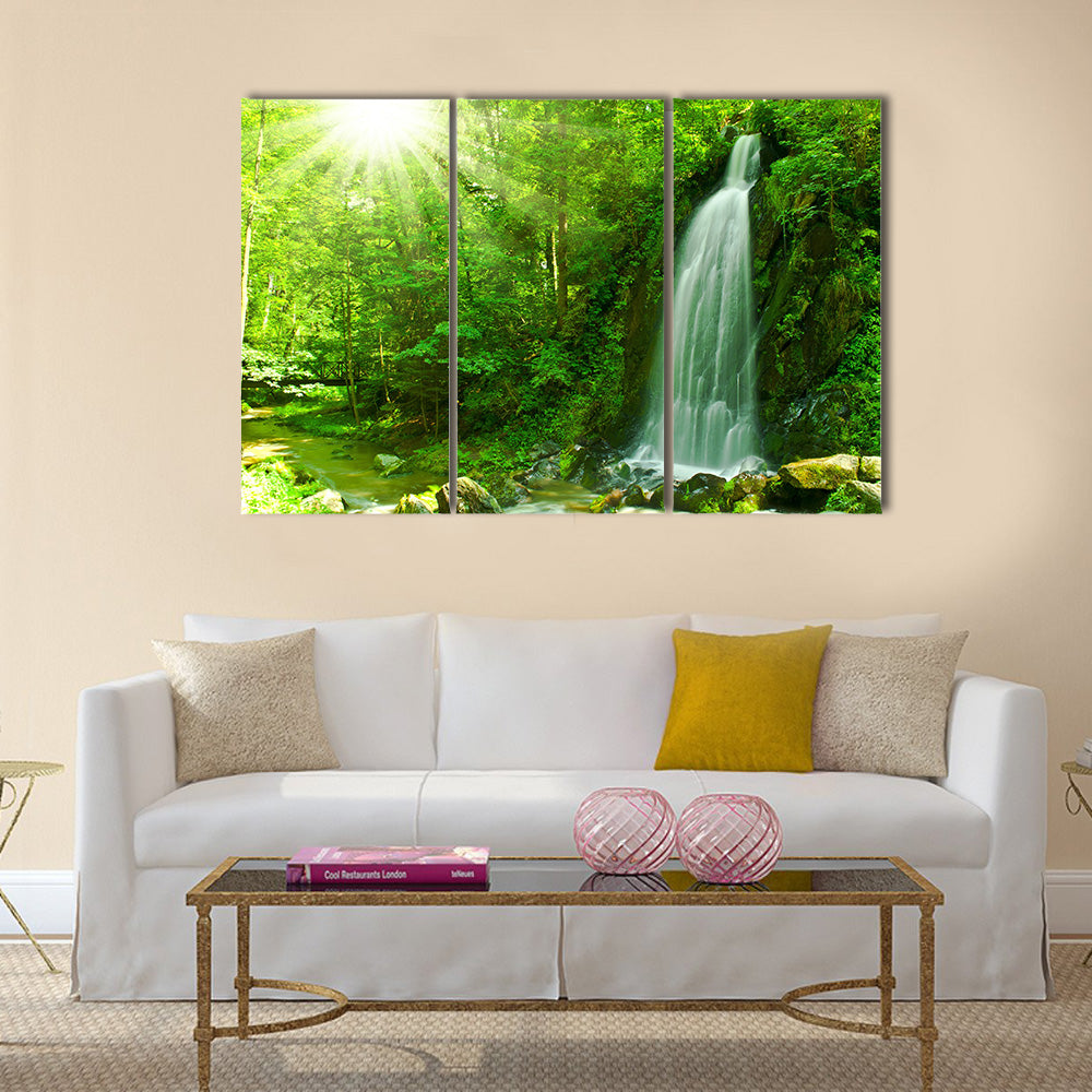 Nice waterfall through green forest Multi Panel Canvas Wall Art