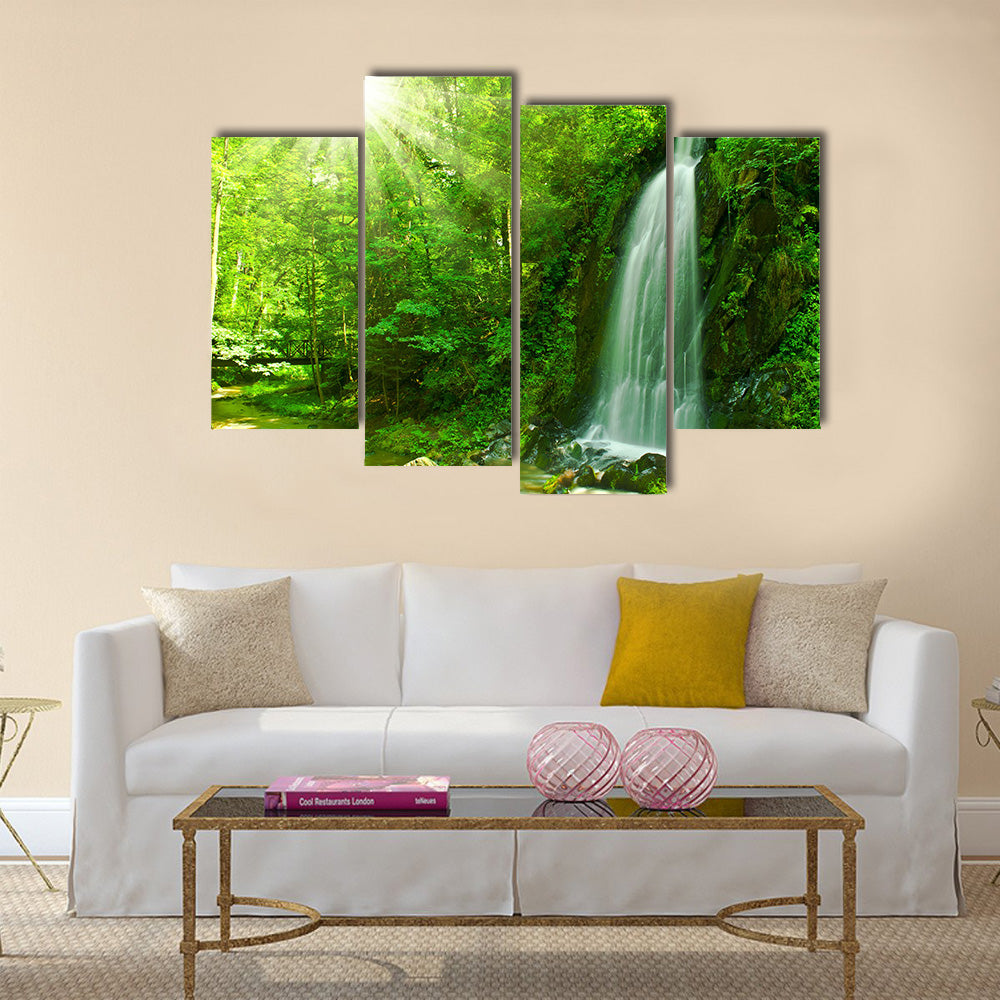 Nice waterfall through green forest Multi Panel Canvas Wall Art