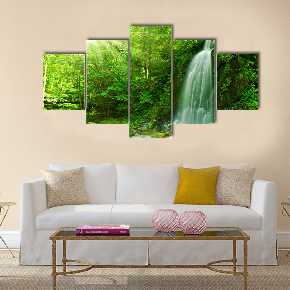 Nice waterfall through green forest Multi Panel Canvas Wall Art