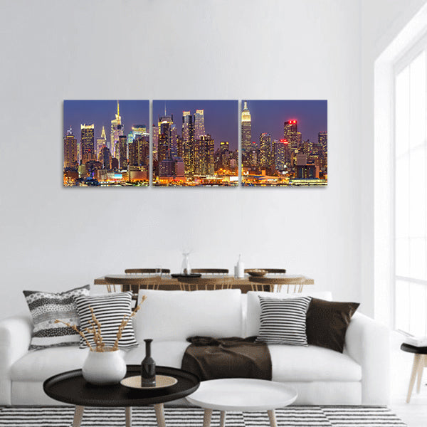 View of Manhattan at night panoramic canvas wall art