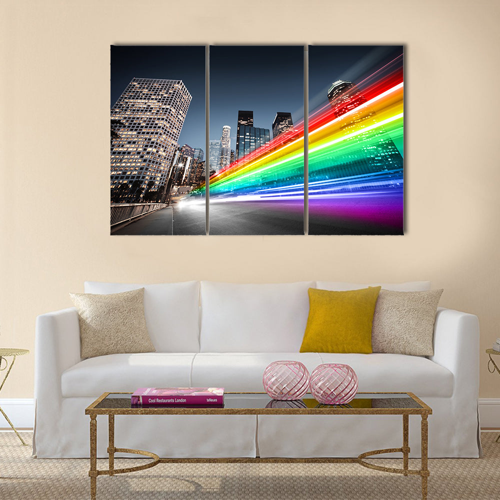 Colorful rainbow blurred bus traffic in Los Angeles Multi Panel Canvas Wall Art