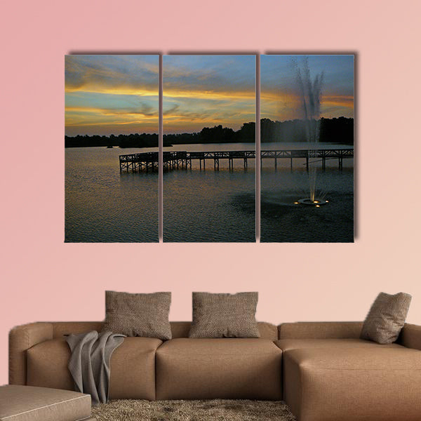 Sunrise on the lake with fountain and pier multi panel canvas wall art