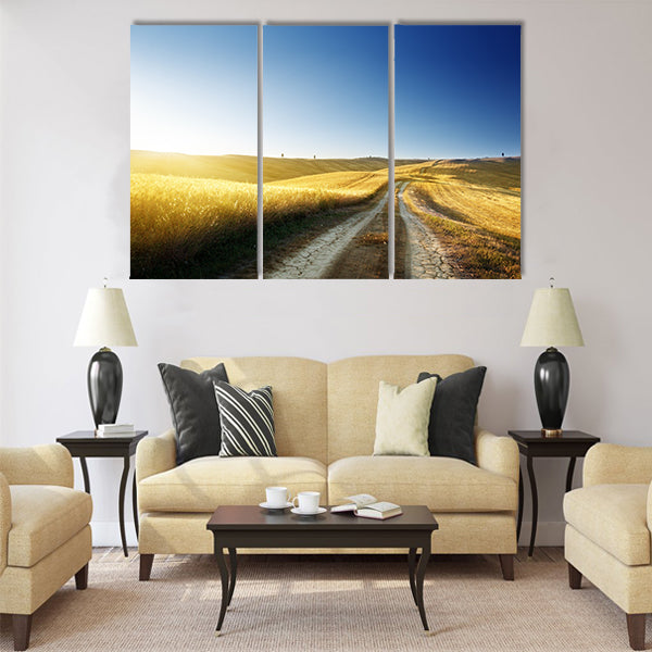 ground road on field in Tuscany Multi Panel Canvas Wall Art