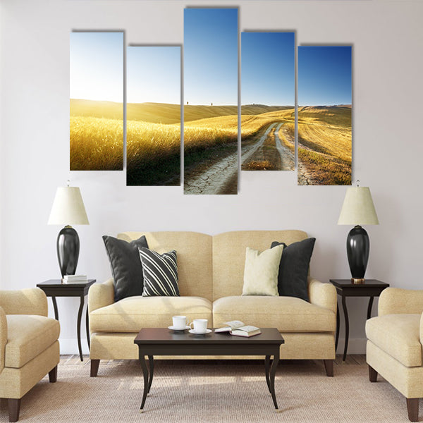 ground road on field in Tuscany Multi Panel Canvas Wall Art