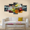 Fresh Fruit and Vegetables being shot as they submerged under water Multi panel canvas wall art