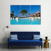 Swimming pool in Caribbean resort Multi panel canvas wall art