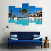 Swimming pool in Caribbean resort Multi panel canvas wall art