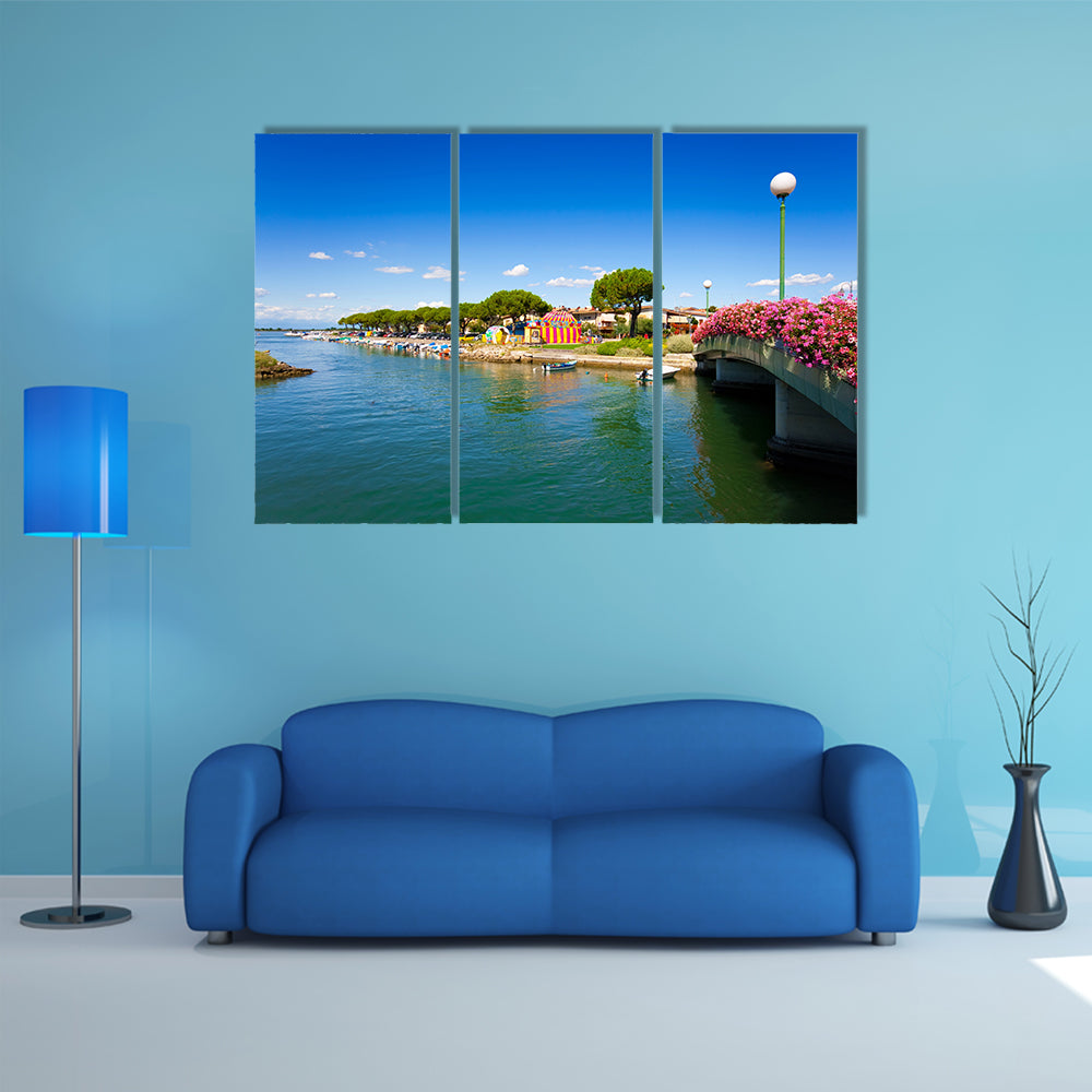 A Beautiful scene in the city center of Grado, Italy Multi Panel canvas wall art