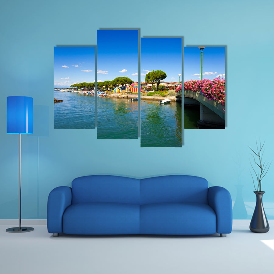 A Beautiful scene in the city center of Grado, Italy Multi Panel canvas wall art