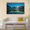 Reflection of mount Assiniboine on Magog lake Multi panel canvas wall art