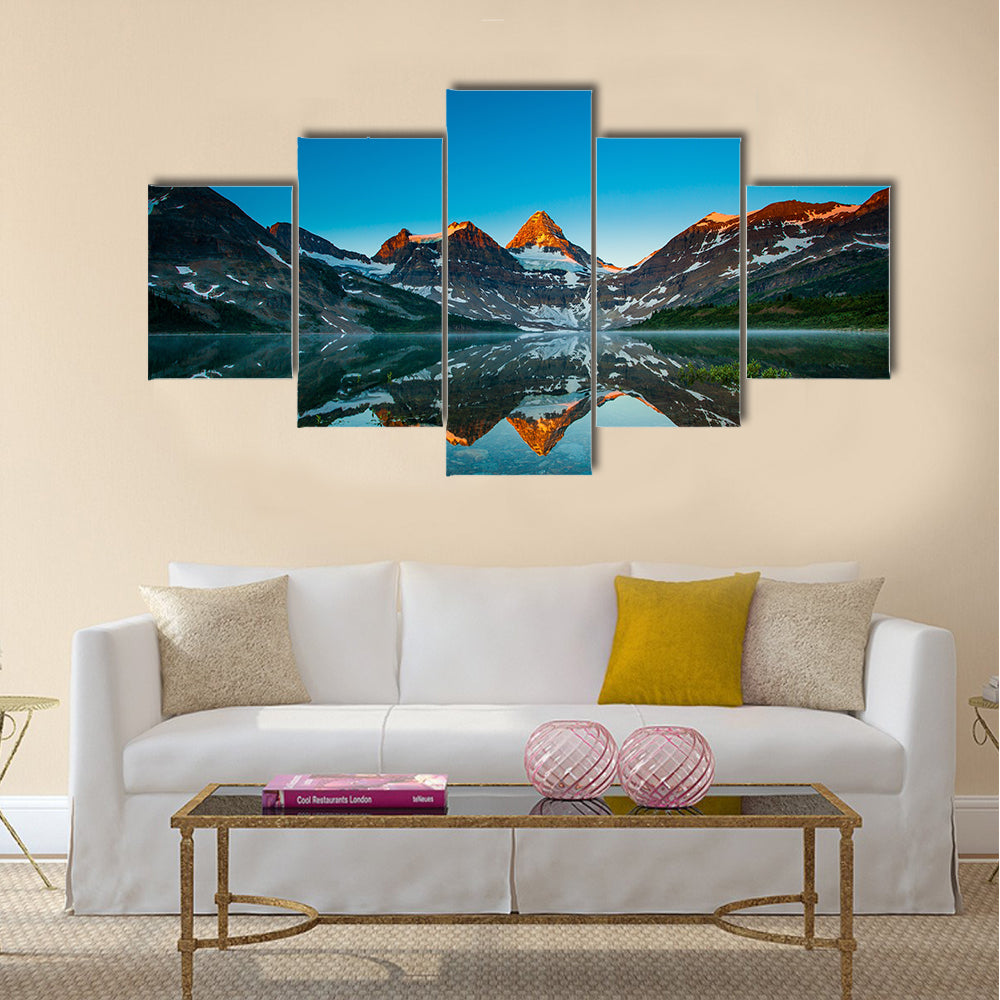 Reflection of mount Assiniboine on Magog lake Multi panel canvas wall art