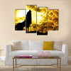 Wolf howling at the sunset Multi Panel Canvas Wall Art