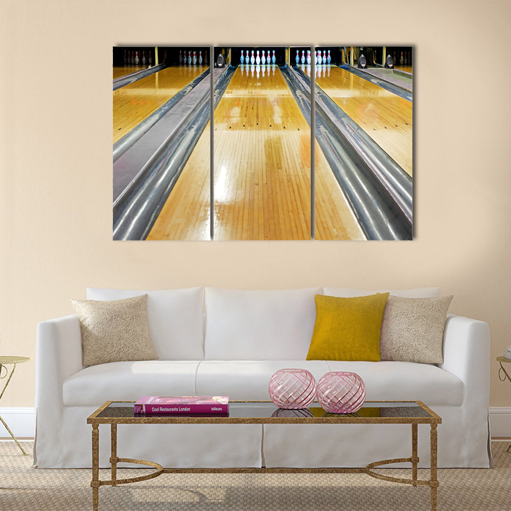 Pins at the end of bowling lane Multi panel canvas wall art