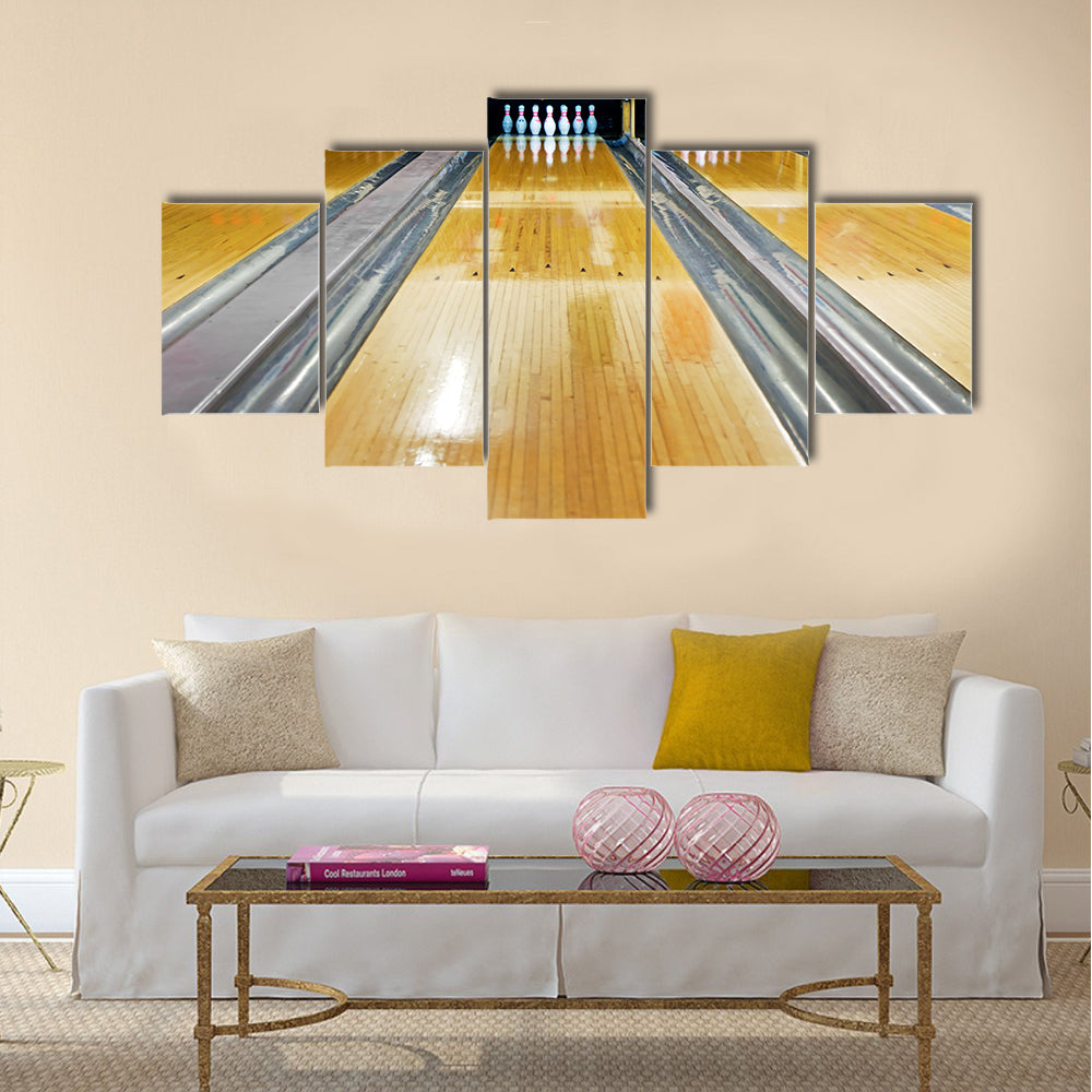 Pins at the end of bowling lane Multi panel canvas wall art