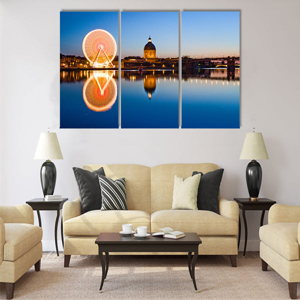 Big wheel in the evening in Toulouse city ancient center Multi Panel Canvas Wall Art