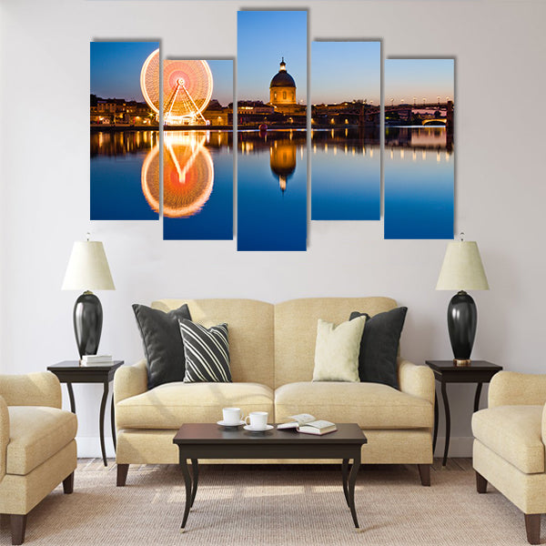 Big wheel in the evening in Toulouse city ancient center Multi Panel Canvas Wall Art