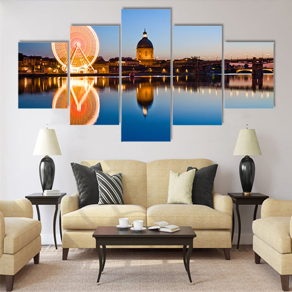 Big wheel in the evening in Toulouse city ancient center Multi Panel Canvas Wall Art
