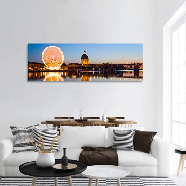 Big wheel in the evening in Toulouse city ancient center panoramic canvas wall art