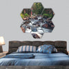 mountain stream flowing through forest between boulders hexagonal canvas wall art