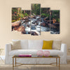 Dreamy mountain stream flowing through forest between boulders Multi Panel Canvas Wall Art